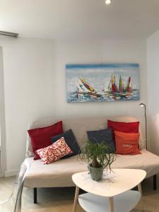 O zonă de relaxare la Duplex 6 pers piscine et vue mer