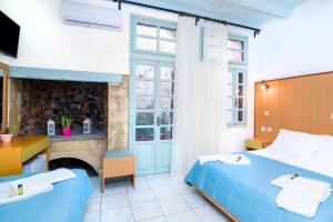 Postel nebo postele na pokoji v ubytování Alegria Pension + 20 fotografií