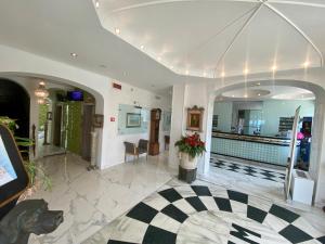 TV a/nebo společenská místnost v ubytování Grand Hotel Michelacci