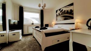Cama ou camas em um quarto em Xenos Apartments
