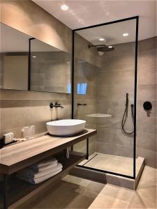 Een badkamer bij Boutique Hotel 'Hof ter Duinen'