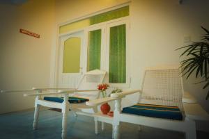 Posezení v ubytování Kanada House Unawatuna