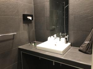 Koupelna v ubytování Hotel Dauphin