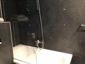 Koupelna v ubytování Hotel Dauphin