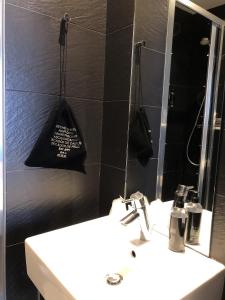 Koupelna v ubytování Hotel Dauphin