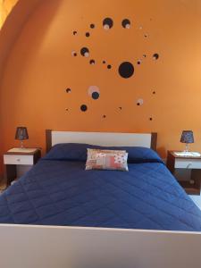 Ένα ή περισσότερα κρεβάτια σε δωμάτιο στο La civita 1