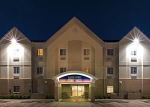 una representación de la parte delantera de un hotel por la noche en Candlewood Suites Conway, an IHG Hotel en Conway