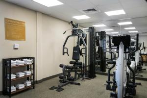 a gym with several tread machines in a room at Candlewood Suites Conway, an IHG Hotel in Conway