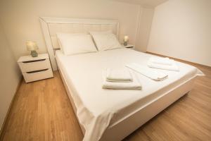 Postel nebo postele na pokoji v ubytování Apartment Boljevic