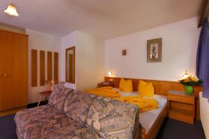 Postel nebo postele na pokoji v ubytování Haus Anton Sölden - Apartments & Zimmer