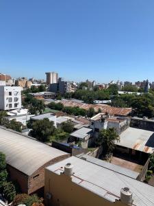 an overhead view of a city with buildings and trees at Dpto Alquiler Temporario in Corrientes