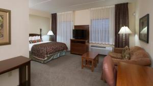 Postel nebo postele na pokoji v ubytování Staybridge Suites Buffalo by IHG + 37 fotografií