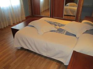 Cama o camas de una habitación en Apartamentos Almagro