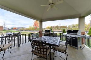 a patio with a table and chairs on a balcony at Candlewood Suites Elmira Horseheads, an IHG Hotel in Horseheads