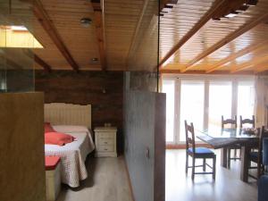 Cama o camas de una habitación en Apartamentos Almagro