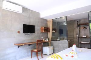 TV a/nebo společenská místnost v ubytování BK Hotel