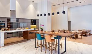 A kitchen or kitchenette at Staybridge Suites - Doha Lusail by IHG