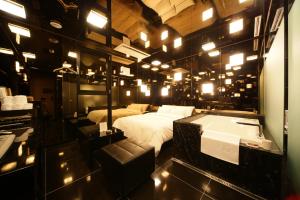 Un pat sau paturi într-o cameră la Hotel Star