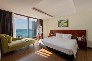 Säng eller sängar i ett rum på Amarin Resort & Spa Phu Quoc