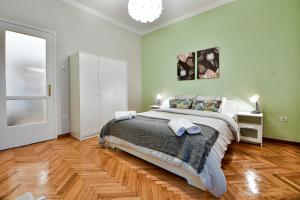 Posteľ alebo postele v izbe v ubytovaní Thiras Lovely Apartment BY ZAIN