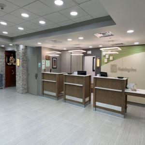 a lobby of a hospital with a waiting room at Holiday Inn Chicago North Shore, an IHG Hotel in Skokie