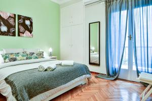 Posteľ alebo postele v izbe v ubytovaní Thiras Lovely Apartment BY ZAIN