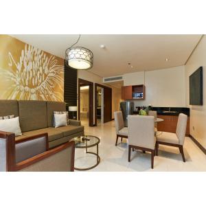 A television and/or entertainment centre at Summit Hotel Tacloban