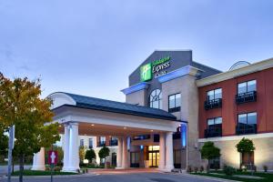 a hotel with a sign on the front of it at Holiday Inn Express Hotel & Suites Dieppe Airport, an IHG Hotel in Moncton
