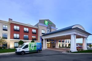 a delivery van parked in front of a gas station at Holiday Inn Express Hotel & Suites Dieppe Airport, an IHG Hotel in Moncton