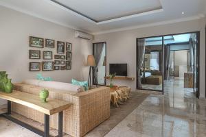 Uma TV ou centro de entretenimento em Nunamkhalu Private Villa and Spa