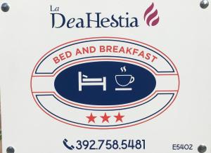 una representación del signo de bed and breakfast del bed and breakfast en B&B La Dea Hestia en Bosa