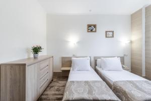 Voodi või voodid majutusasutuse Hotel Adrenalin toas