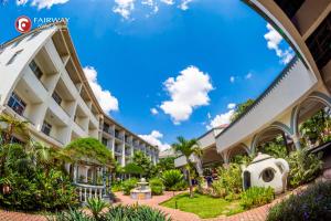 a view of the courtyard of a hotel at Fairway Boutique Hotel - Kampala, Uganda in Kampala