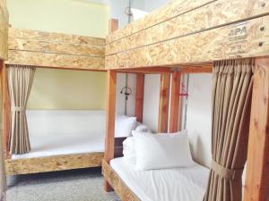 Krevet ili kreveti u jedinici u objektu With Inn Hostel
