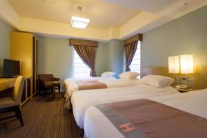 Postelja oz. postelje v sobi nastanitve Hotel Monterey Hanzomon