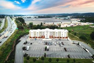 an aerial view of a large building with a parking lot at Candlewood Suites York, an IHG Hotel in York