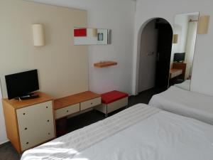 Postel nebo postele na pokoji v ubytování Serhan Hotel