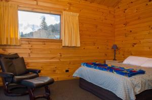 Ένα ή περισσότερα κρεβάτια σε δωμάτιο στο Alpine on Oregon