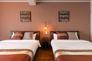 Postel nebo postele na pokoji v ubytování Onnason Prince Plage 1003