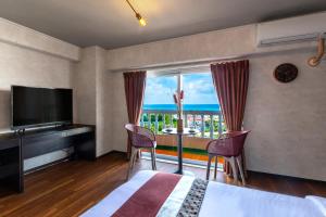 TV a/nebo společenská místnost v ubytování Onnason Prince Plage 1003