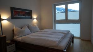 Postel nebo postele na pokoji v ubytování Appartement Silencio by Schladmingurlaub