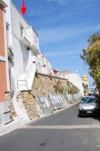 a car parked on a street next to a building at Maridea - Chiaia di Luna in Ponza