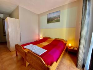Postel nebo postele na pokoji v ubytování The Green Guest House