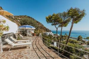 a resort with a view of the ocean at Hotel San Giorgio Terme in Ischia