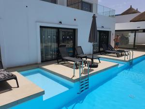 Bazén v ubytování Kalimba Beach Resort nebo v jeho okolí