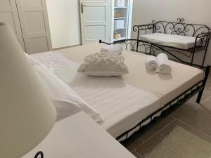 Postel nebo postele na pokoji v ubytování Apartments Rita