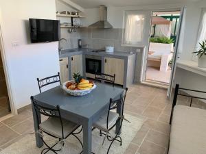 Kuchyň nebo kuchyňský kout v ubytování Apartments Rita