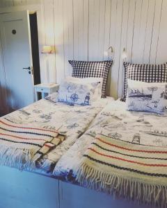 Säng eller sängar i ett rum på Glimminge Bed & Breakfast