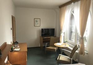 TV a/nebo společenská místnost v ubytování Hotel Otar