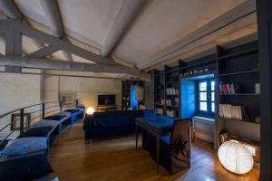 Кровать или кровати в номере MAS SAINT GEORGES DE L'ORATOIRE +51 фотография